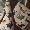 Manique motifs chiens ocre et gris